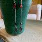 Fuego Earrings - Garnet and Feather Dangle