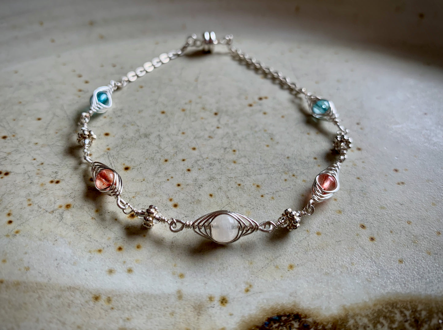 Moria Bracelet - Silver Herringbone Wrapped Moonstone and Quartz